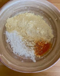 bowl with flours, turmeric, pepper